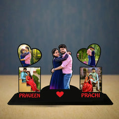 Personalized photo display with cut-out silhouettes of a couple and heart-shaped sections for additional photos, on a dark background.