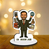 A personalized caricature standee of a Chartered Accountant holding a briefcase, calculator, and money, with custom text 'CA AKASH JAIN' on a premium wooden stand.
